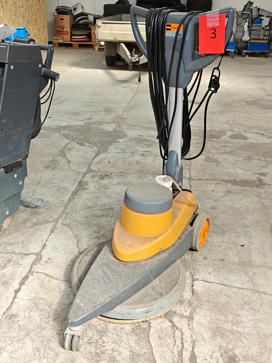 TASKI Ergodisc 1200 gulvpoleringsmaskine med et elektrisk sprayapparat