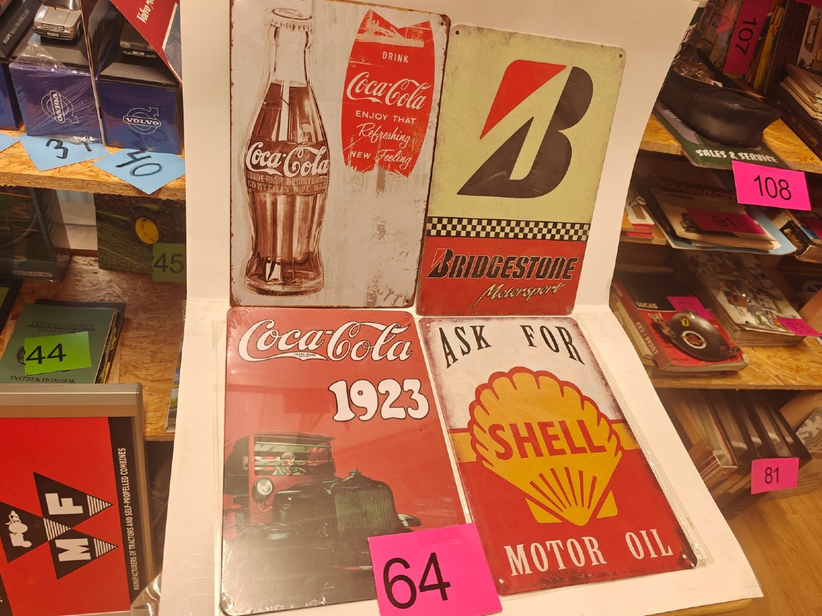 4 Metalskilte m/div motiver. Ubrugte og i emballage.