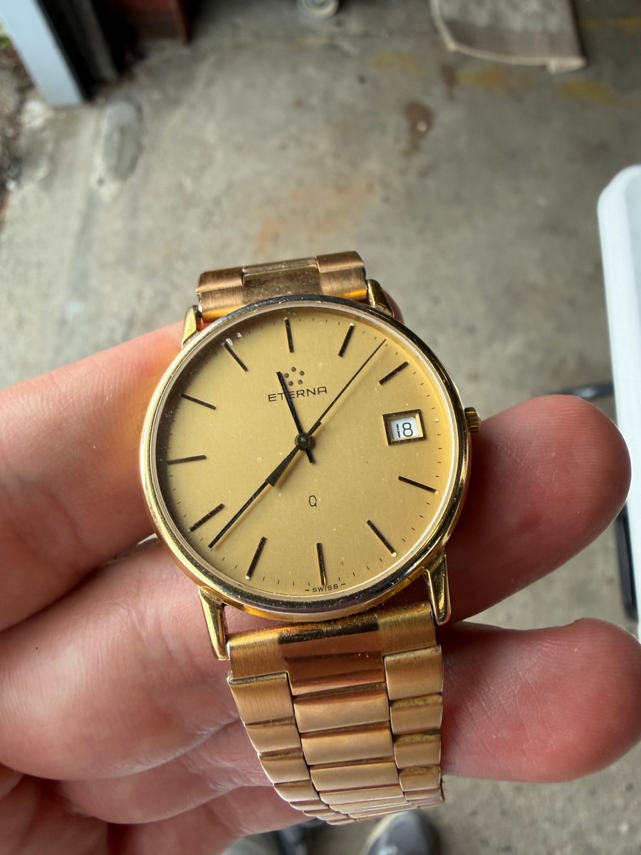 Eterna-Matic herreur i guldfarvet udførelse med dato – ref. 999-1984