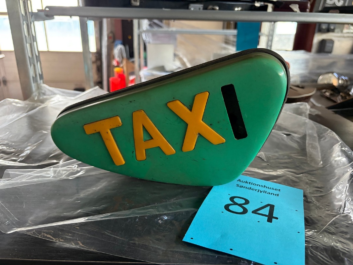 Ældre TAXI-skilt i grøn og gul
